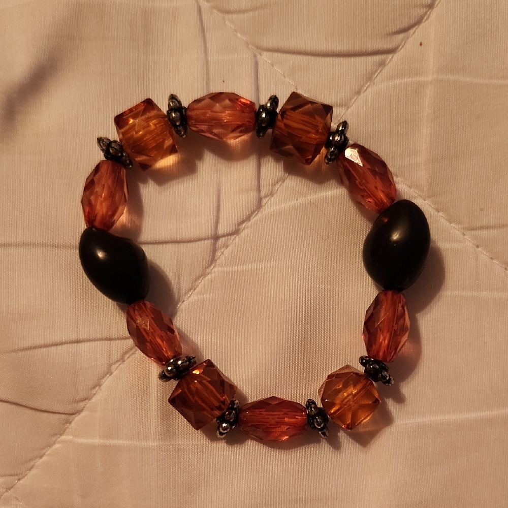 Orange and Brown Beaded Bracelet with Elegant Design